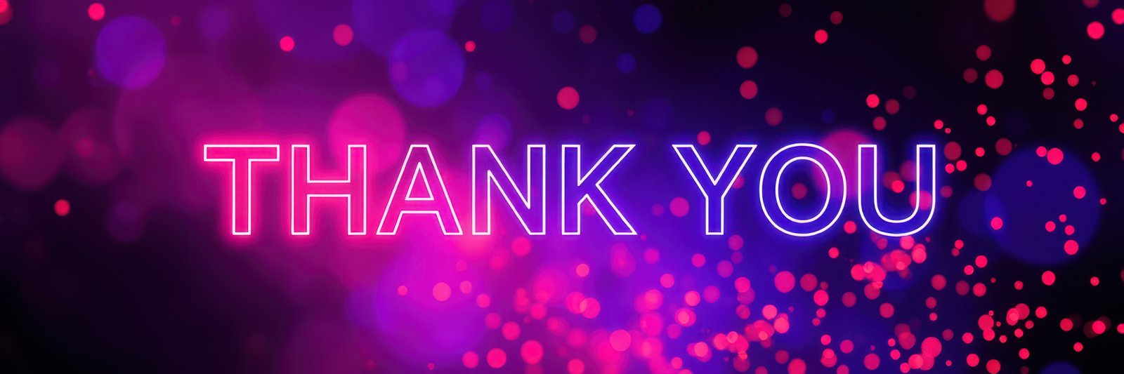 Vibrant display of gratitude with colorful bokeh lights illuminating the phrase in an engaging atmosphere
